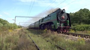 Паровоз П36-0071 с туристическим поездом проходит станцию Зимёнки