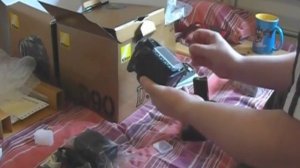 Nikon D90 18-55 MB-D80 ML-L3 Unboxing.wmv