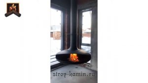 Этапы строительства современного загородного дома, монтажа подвесного камина на дровах стиля хайтек