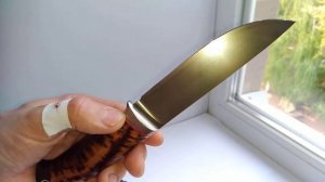 Нож из стали К100.