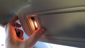 Замена лампы в плафоне освещения солнцезащитного козырька Mazda 6