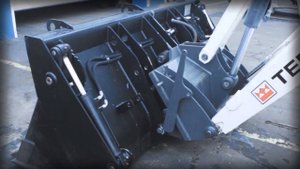 Механический БСМ фронтального ковша экскаватора-погрузчика Terex Impulse QC-BHL-T