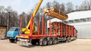 Работа и разгрузка полуприцепа лесовоза MEGA