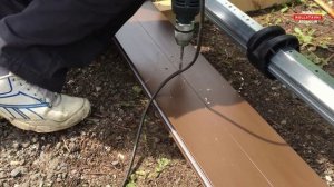 Монтаж въездных рулонных ворот из профиля AG77