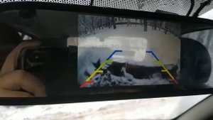 Камера заднего вида с кнопкой.