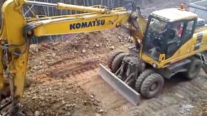 Komatsu PW180- skopavanie cesty
