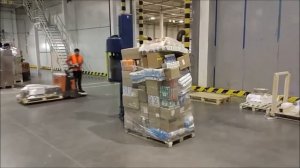 Упаковка паллет на логистическом складе | Самоходный робот-паллетообмотчик ROBOPAC