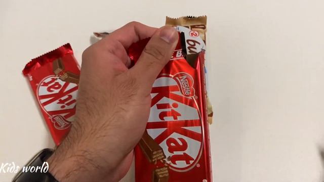 Unwrapping Lots of Chocolate  Candies - Kit Kat Kinder Bueno ?
