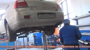Установка прямоточной банки глушителя на Mitsubishi Galant.Установка глушителя в СПБ