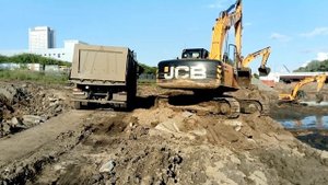 Очистка пруда от ила