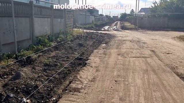 Капитальный ремонт дороги по ул Школьная в селе Молочное смотреть онлайн