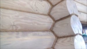 Натяжной потолок на брёвнах