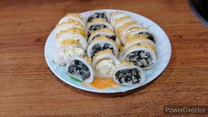 Фаршированный кальмар двумя начинками яйцом и грибами