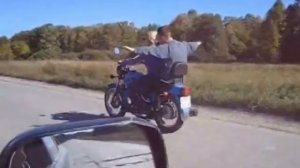 Девушка за рулем мотоцикла Иж Планета 5 Girl driving a retro motorcycle Izh Planet 5