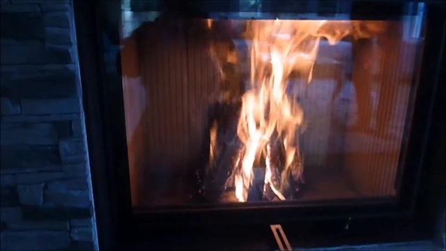 Камин с облицовкой из натурального камня. смотреть онлайн