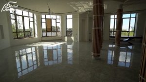 Авторский проект дома с витражными окнами на рельефном участке в Расторопово