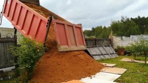 Доставка и выгрузка песка 25 тонн.