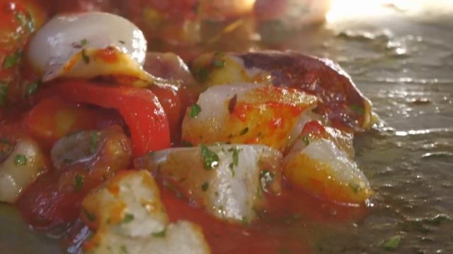 Spanish Guy cooks Paella with much Love at Market  Street Food in Berlin Germany