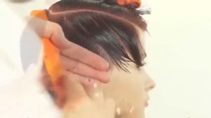 Модельная женская стрижка на короткие волосы с удлиненной косой челкой