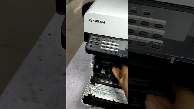 how to change Kyocera printer cartridge