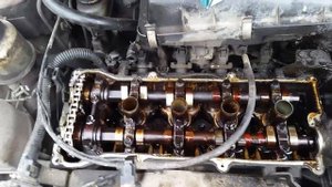 замена сальников свечных колодцев nissan cube z10
