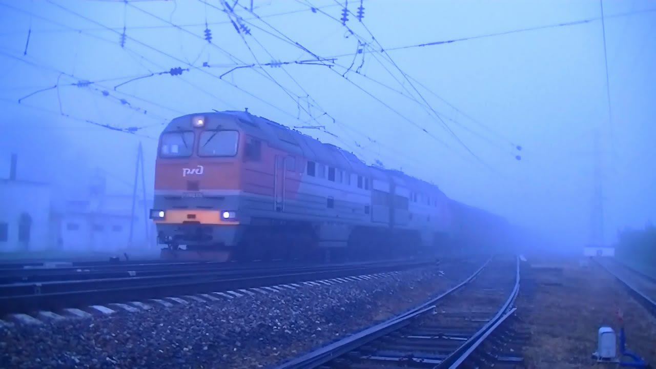 РЖД 2ТЭ116УД-023 с грузовым поездом смотреть онлайн