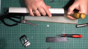 Установка пряжки на ремень.