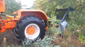 Кусторез мульчер фрезеровщий на базе ХТЗ 150К 09 25 15 пней в работе