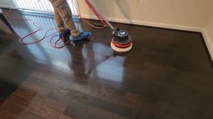 Removing Bona polish from prefinished hardwood floors.