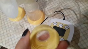 Молокоотсос электрический китайский