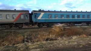 М62 с пригородным поездом Киров-Луза на ст. Вазюк