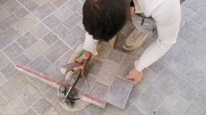 The worker who makes the tile dance - you need to see