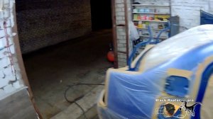 Renault Logan в сверхпрочном покрытии Raptor синего цвета