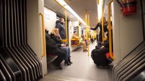 Poland, Warsaw, metro ride from Rondo ONZ to Nowy Świat-Uniwersytet, 3X escalator