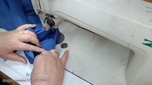 Обработать низа брюк манжетами.