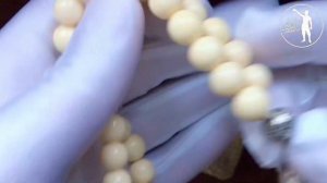 Чётки от Кости Цзю из слоновой кости, с боксёрскими перчатками.