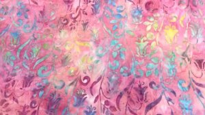 pink cotton batik fabric with rainbow flowers on turquoise blue yellow green - modes4u -