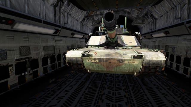 Погрузка техники в самолет C-17.