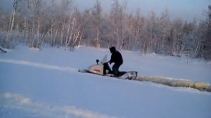 Снегоход Буран по наледи