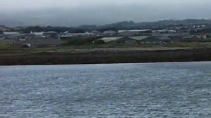 Plane landing at Ronaldsway Airport Isle of Man IOM Manx