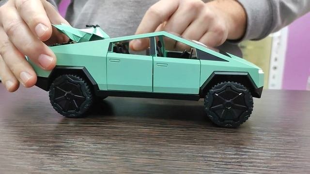 Обзор машинки Тесла Cybertruck масштаб 1:24 мятная #tesla #обзормашинок #cybertruck