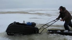 Мотобуксировщик и рыбинский слуд