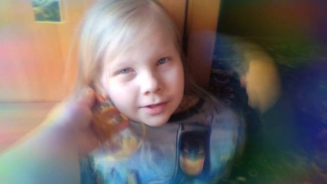 Длинноволосый мальчик