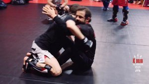 MMA, get up from the bottom using butterfly guard.  Подъём в стойку из гарда бабочка.