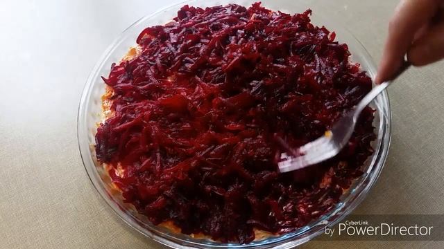 Селедка под шубой с яблоками.