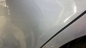 Сложный ремонт вмятины без покраски на двери автомобиля Kia Rio