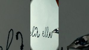 Греческий алфавит прописными буквами перьевой ручкой.