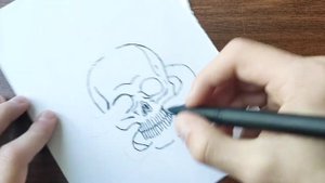 рисунок черепа со змеей