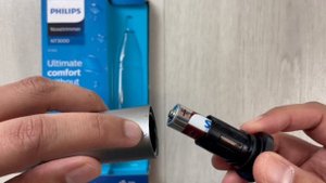 How to Insert Battery In Philips Nose Ear And Eyebrow Trimmer NT3650/16 - NT3000