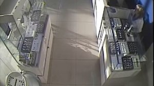 Запись с видеокамеры наблюдения магазина вор длинные руки
